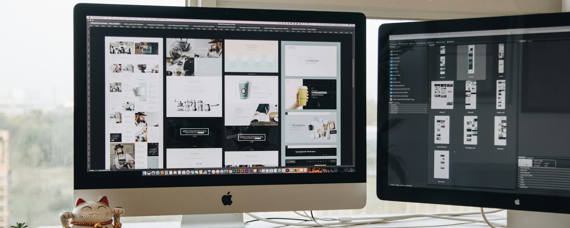 Clean UI/UX designer workspace with dual monitors and a laptop