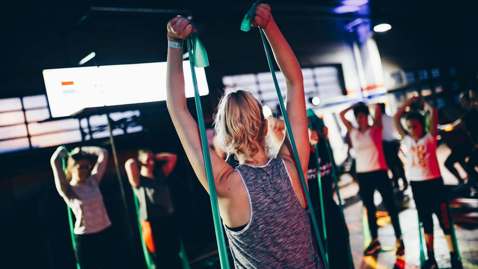 Group functional fitness training in a bright modern gym